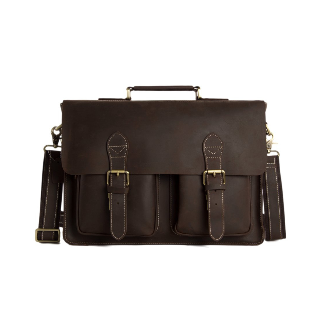 Handmade vintage design satchel made with selected genuine cow leather. The leather is very thick and top quality. It can be carried as a everyday bag for men perfectly. The bag can be fit 14''-15'' inches laptop, also there are many pockets inside and outside of the bag, which makes it very suited for storage and organization.
