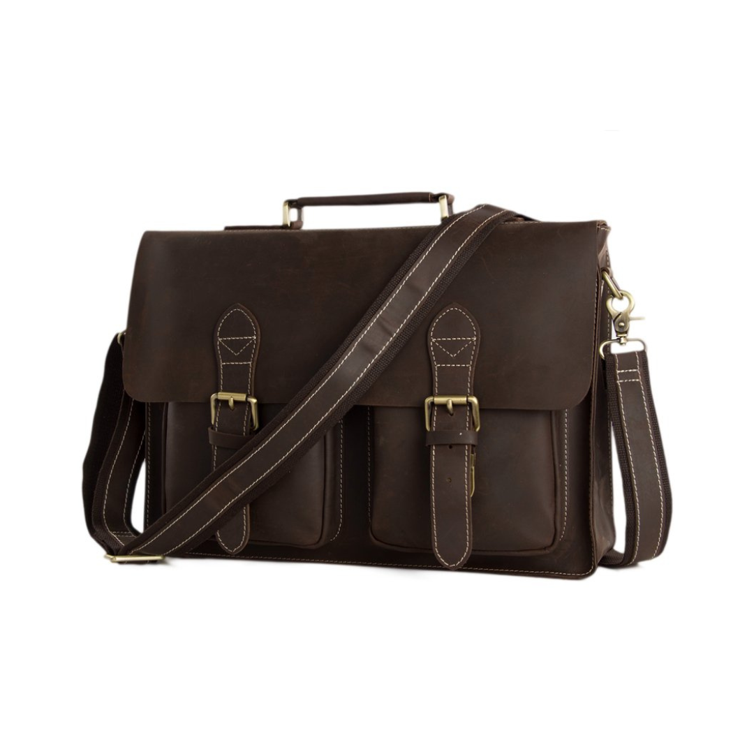 Handmade vintage design satchel made with selected genuine cow leather. The leather is very thick and top quality. It can be carried as a everyday bag for men perfectly. The bag can be fit 14''-15'' inches laptop, also there are many pockets inside and outside of the bag, which makes it very suited for storage and organization.