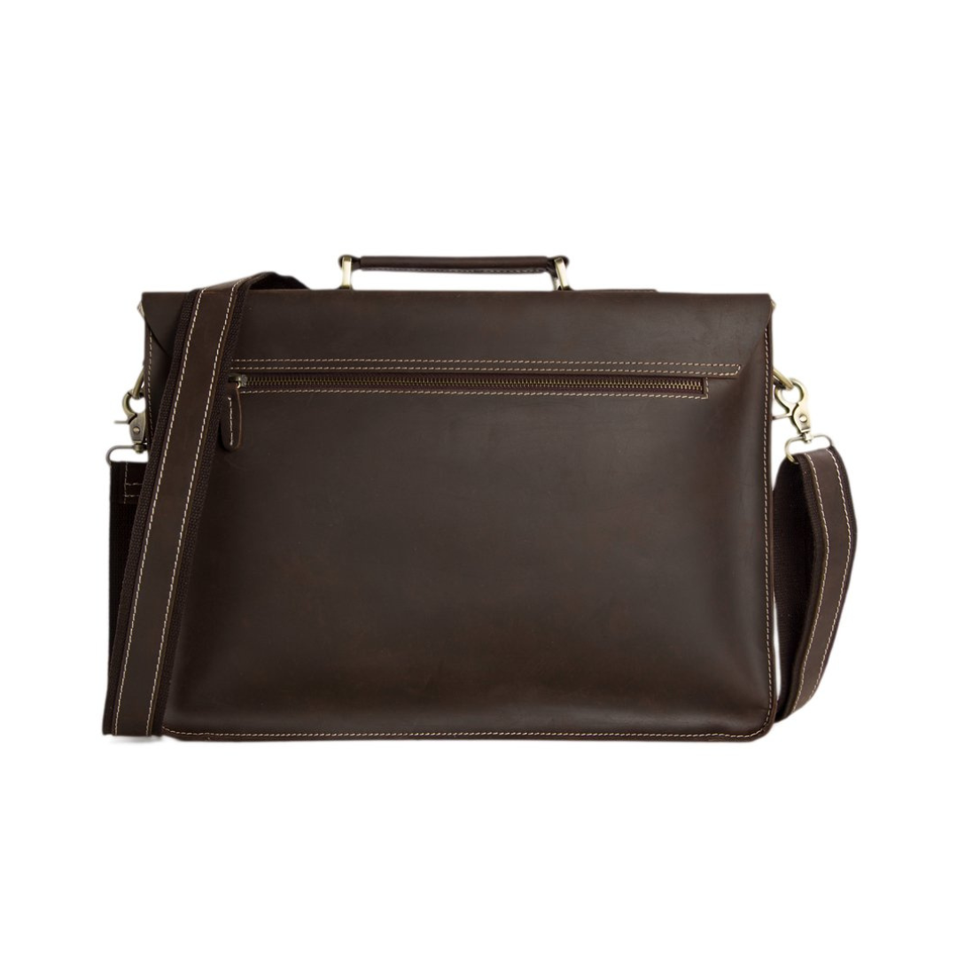 Handmade vintage design satchel made with selected genuine cow leather. The leather is very thick and top quality. It can be carried as a everyday bag for men perfectly. The bag can be fit 14''-15'' inches laptop, also there are many pockets inside and outside of the bag, which makes it very suited for storage and organization.