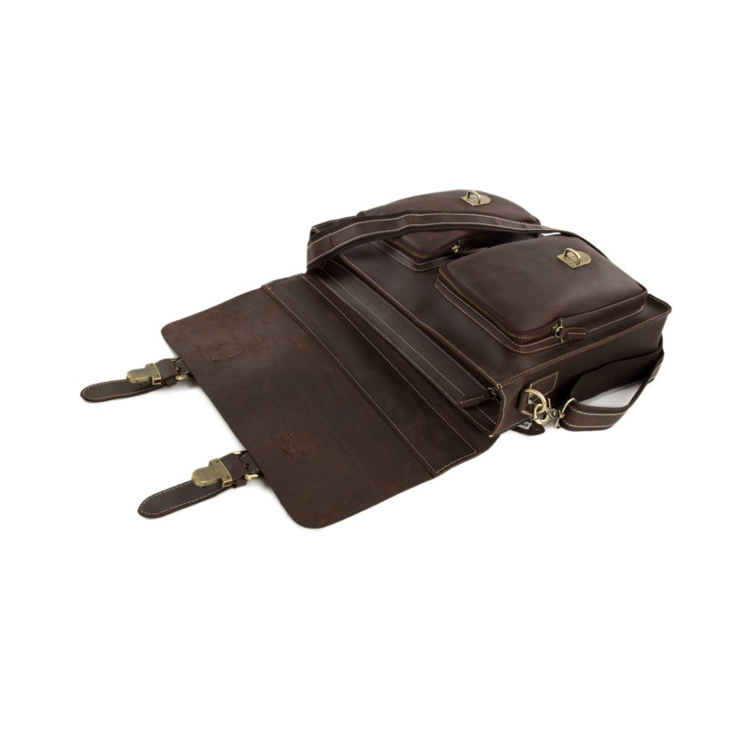 Handmade vintage design satchel made with selected genuine cow leather. The leather is very thick and top quality. It can be carried as a everyday bag for men perfectly. The bag can be fit 14''-15'' inches laptop, also there are many pockets inside and outside of the bag, which makes it very suited for storage and organization.